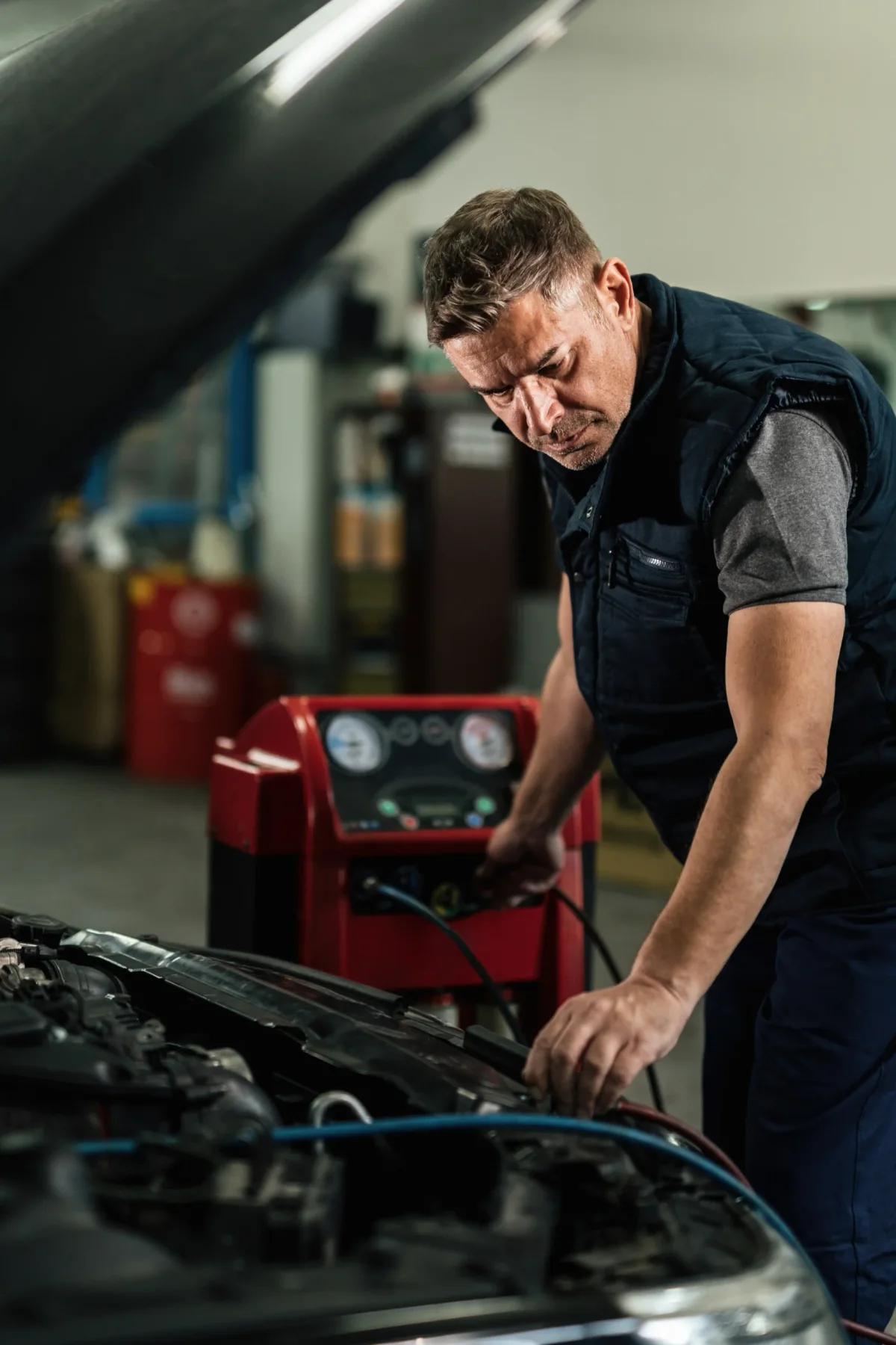 Mechanic working on vehicle